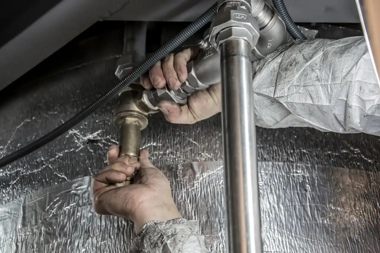 Pipe fittings at a water heater